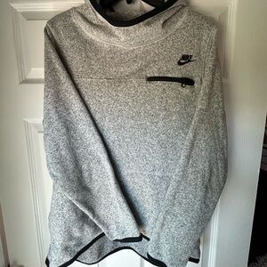 Like new Nike brand swoop neck pullover hoodie! Very warm. In great condition.